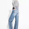 Slitna 90-talsjeans med vida ben Slitna 90-talsjeans med vida ben