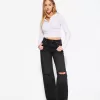 Slitna 90-talsjeans med vida ben Slitna 90-talsjeans med vida ben