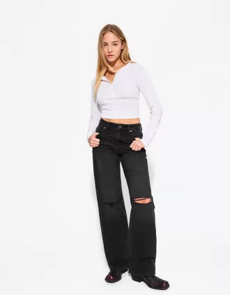 Slitna 90-talsjeans med vida ben