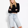 Slitna 90-talsjeans med vida ben Slitna 90-talsjeans med vida ben