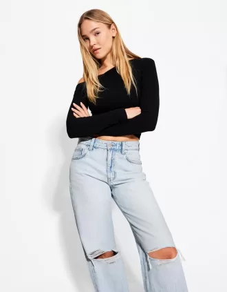 Slitna 90-talsjeans med vida ben