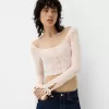 Spets T-shirt med rosetter