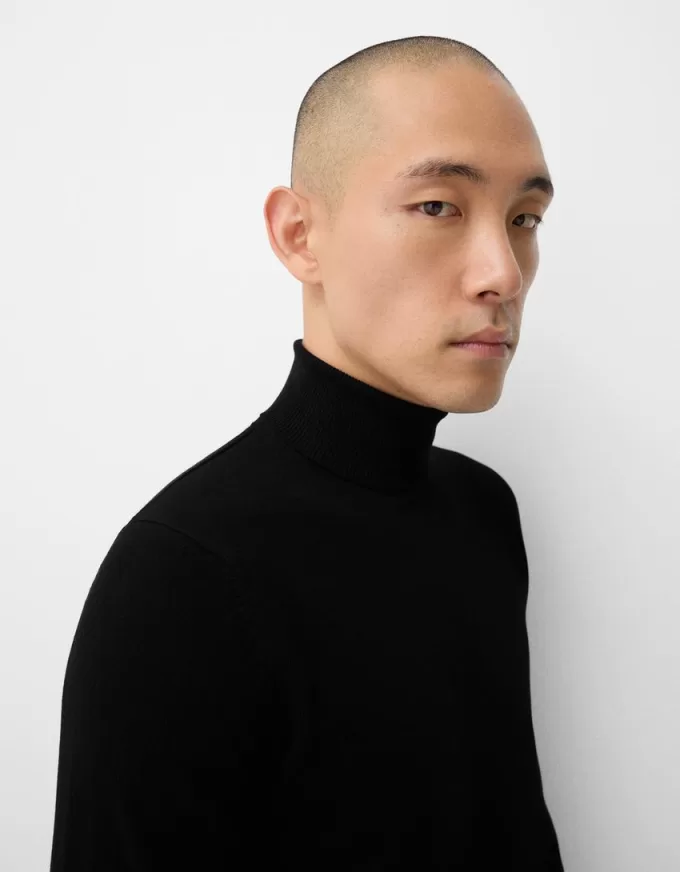 Stickad turtleneck tröja Stickad turtleneck tröja