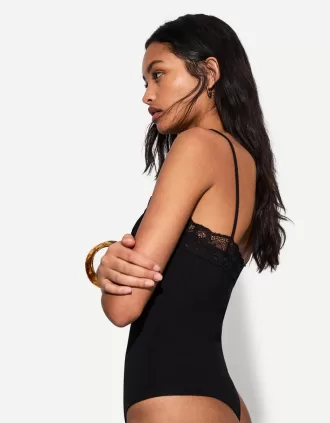 Strappy blond spets bodysuit