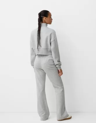 Sweatshirt med dragkedja med broderi