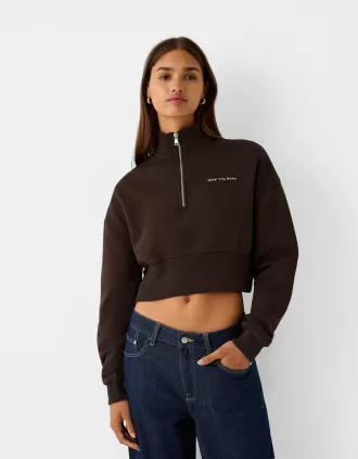 Sweatshirt med dragkedja med broderi