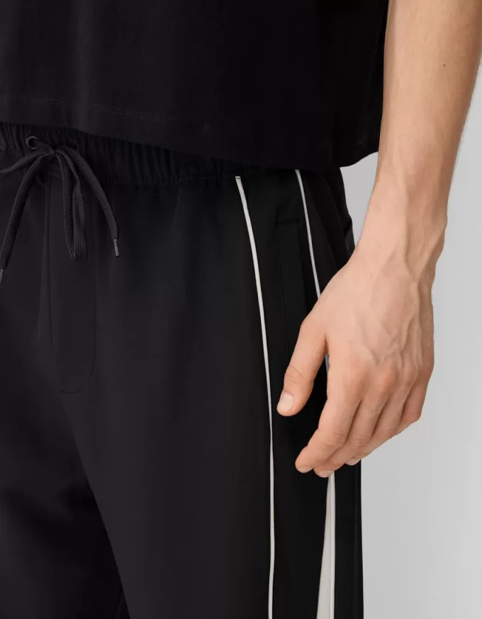 Tekniska baggy byxor Tekniska baggy byxor