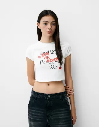 Tryckt t-shirt med korta raglanärmar