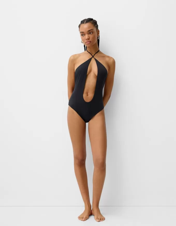 Utskuren baddräkt med halterhals Utskuren baddräkt med halterhals