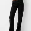 Utsvängda jeans med delad fåll Utsvängda jeans med delad fåll