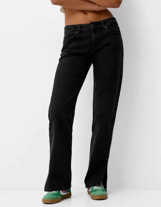 Utsvängda jeans med delad fåll Utsvängda jeans med delad fåll