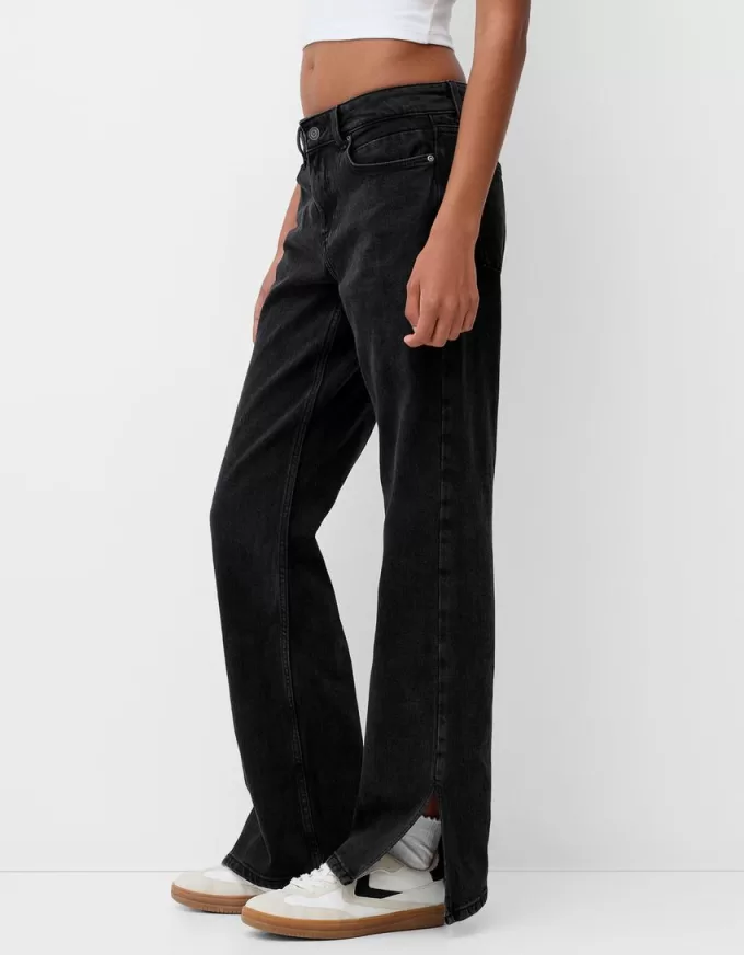 Utsvängda jeans med delad fåll Utsvängda jeans med delad fåll