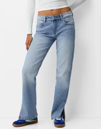 Utsvängda jeans med delad fåll