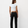 Utsvängda jeans med delad fåll Utsvängda jeans med delad fåll