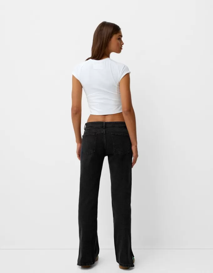 Utsvängda jeans med delad fåll Utsvängda jeans med delad fåll