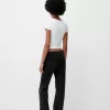 Utsvängda jeans med delad fåll Utsvängda jeans med delad fåll