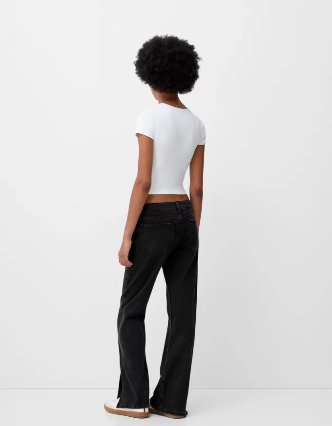 Utsvängda jeans med delad fåll Utsvängda jeans med delad fåll