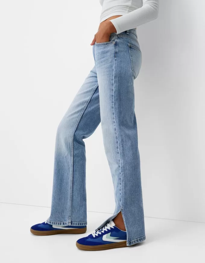 Utsvängda jeans med delad fåll Utsvängda jeans med delad fåll