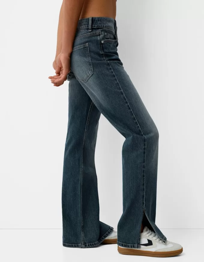 Utsvängda jeans med delad fåll Utsvängda jeans med delad fåll