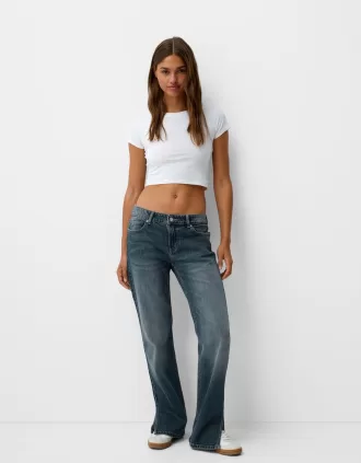 Utsvängda jeans med delad fåll