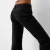 Utsvängda jeans med delad fåll Utsvängda jeans med delad fåll