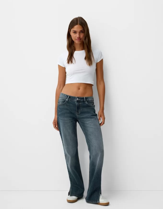 Utsvängda jeans med delad fåll Utsvängda jeans med delad fåll