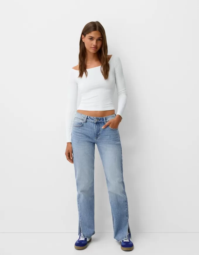 Utsvängda jeans med delad fåll Utsvängda jeans med delad fåll