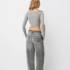 V-ringad off-shoulder tröja V-ringad off-shoulder tröja