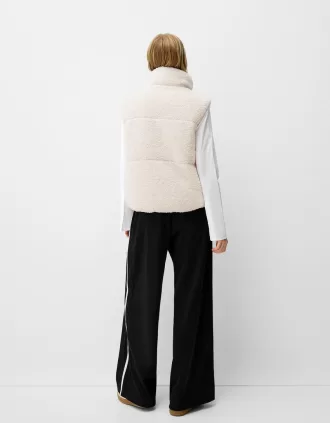 Vändbar faux shearling-väst
