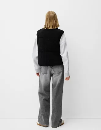 Vändbar faux shearling-väst