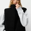 Vändbar faux shearling-väst Vändbar faux shearling-väst