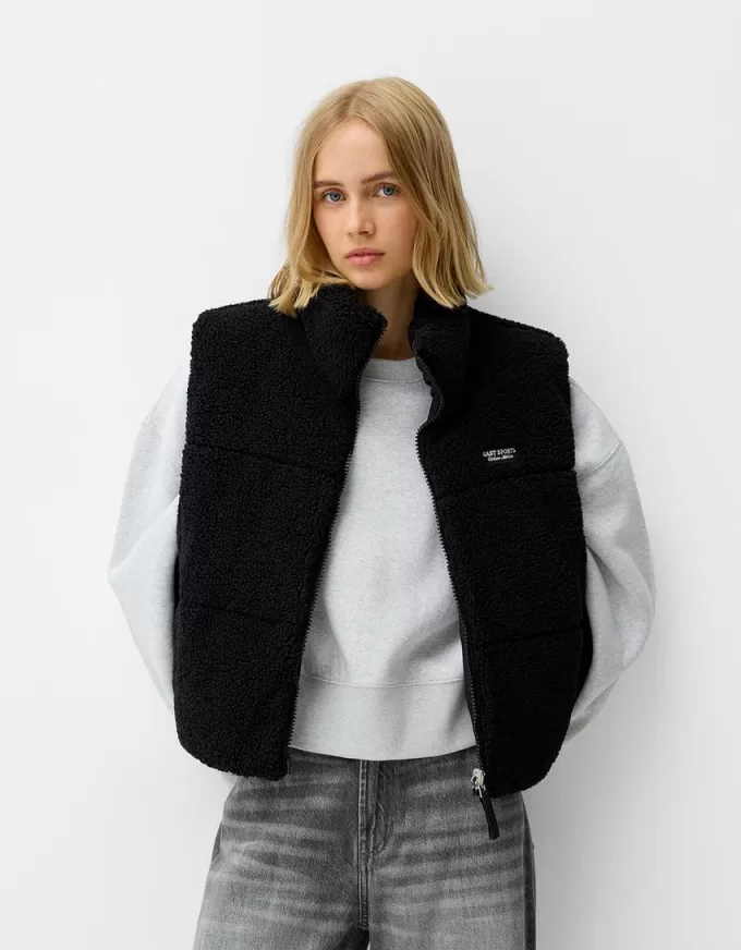 Vändbar faux shearling-väst Vändbar faux shearling-väst