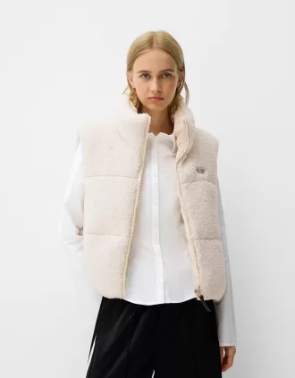 Vändbar faux shearling-väst