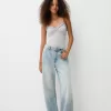 Volang bodysuit med remmar