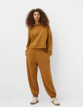 Voluminösa interlock joggingbyxor